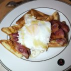 Waffles with bacon, egg and syrup